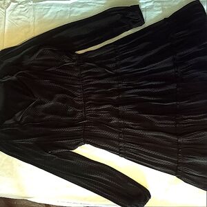 I'm selling a Medium-sized, Short, Black Minidress.